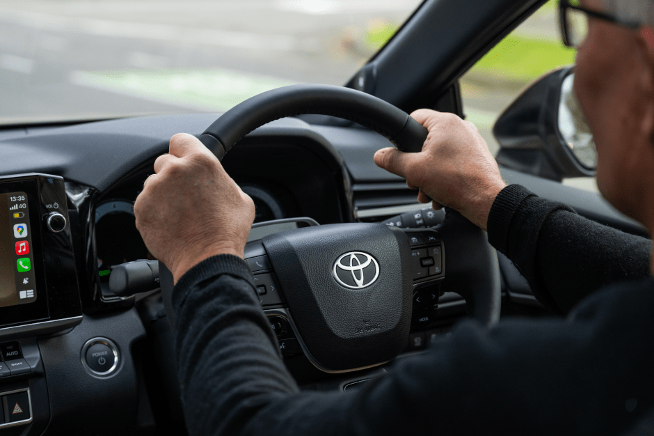 Image 11-Driver's hand on the Steering Wheel-min